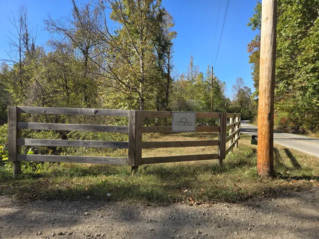 a view of outdoor space with deck and garden
