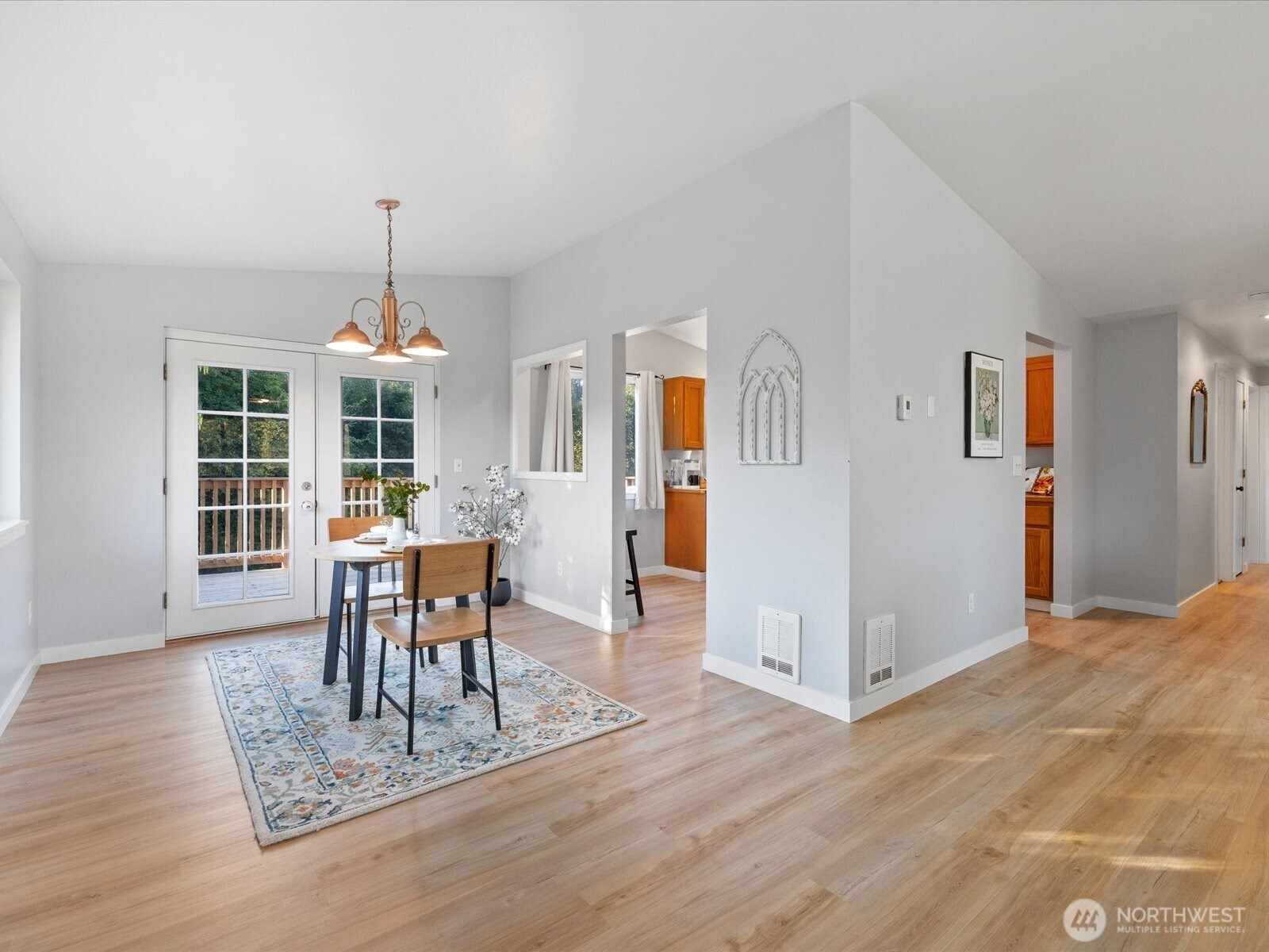 13802 State Rte 530 Northeast Arlington, WA 98223 - Photo 11 of 40 a view of a livingroom with furniture and wooden floor