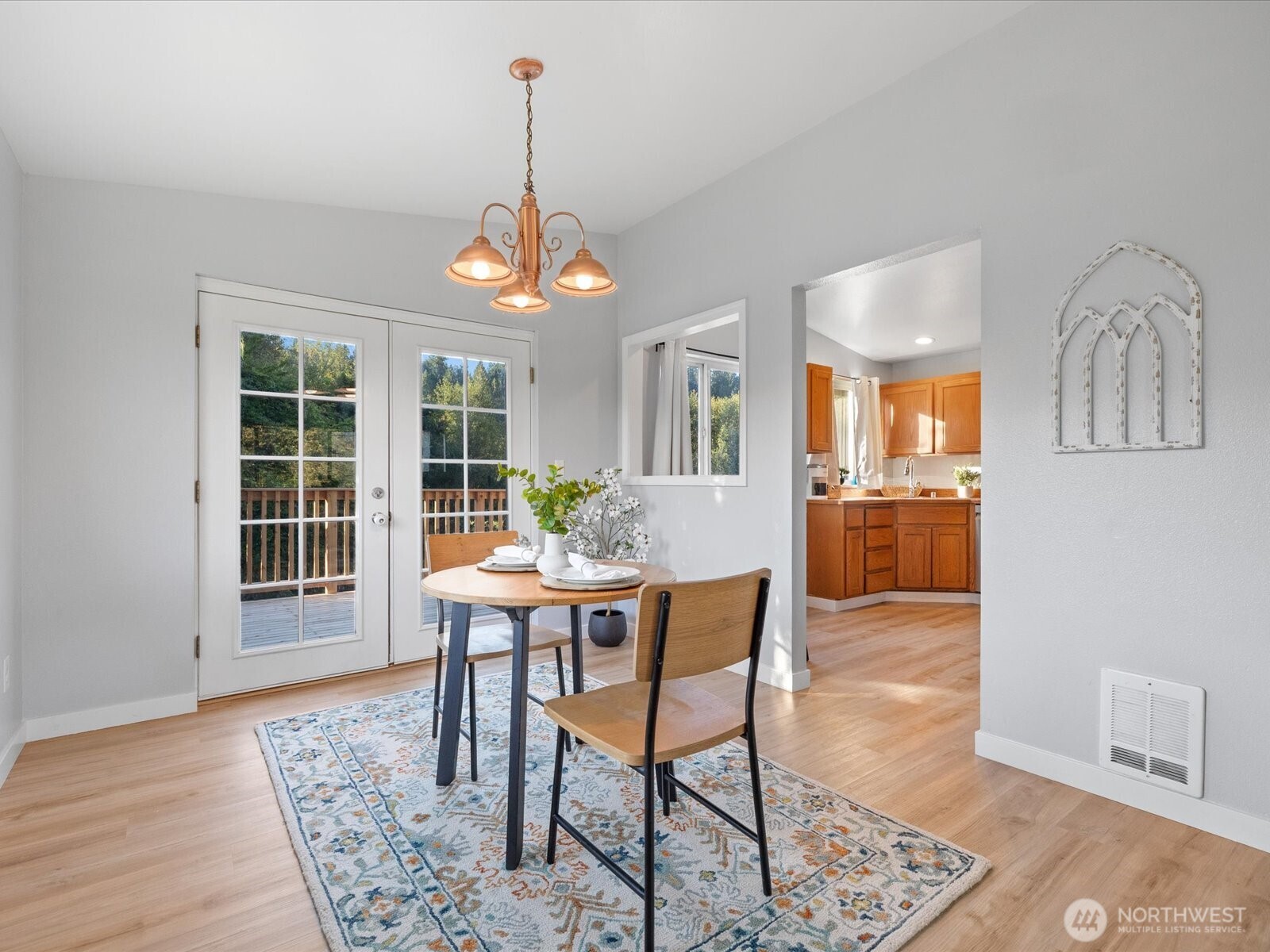 13802 State Rte 530 Northeast Arlington, WA 98223 - Photo 12 of 40 a view of a dining room with furniture window and wooden floor