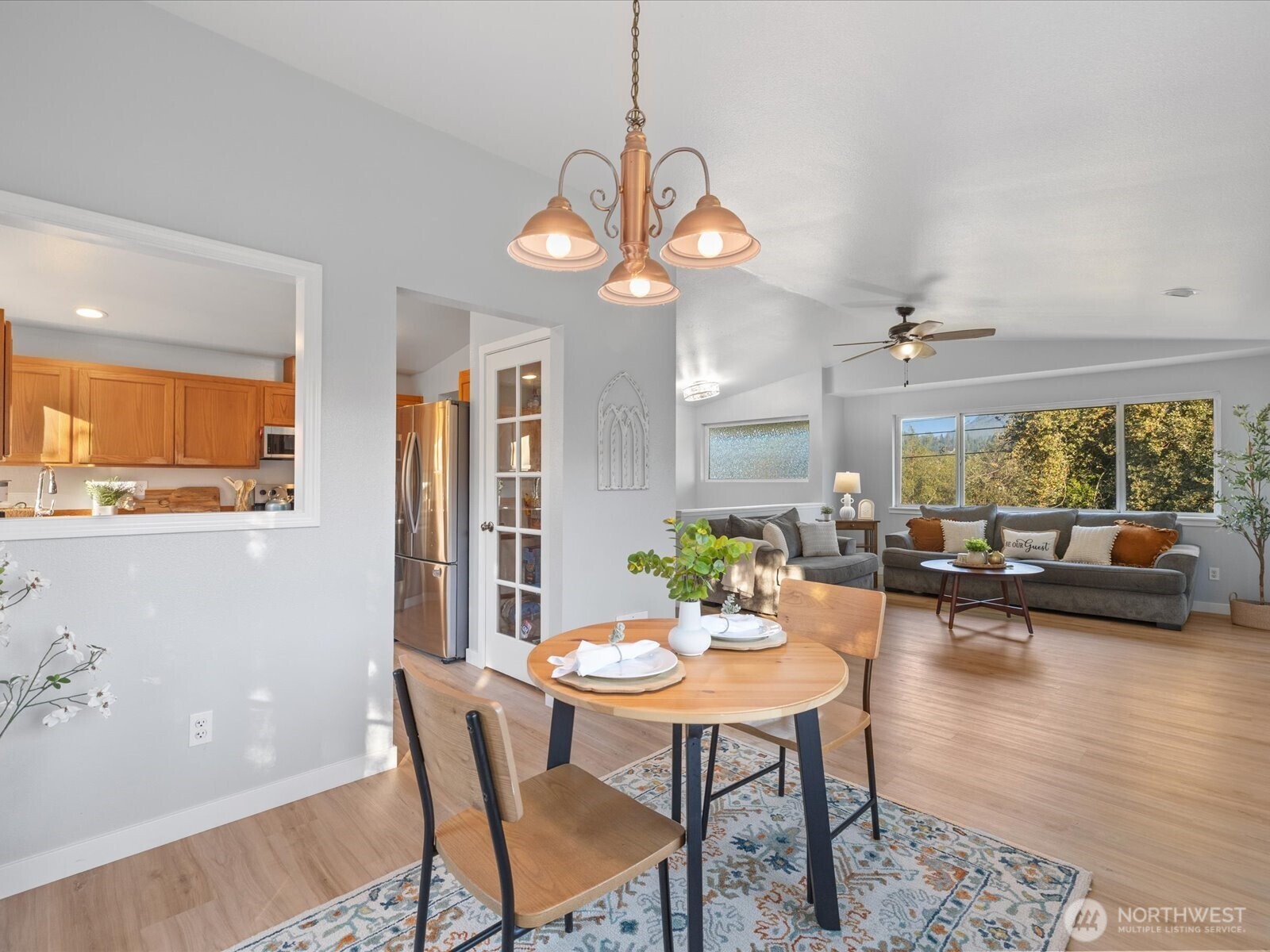 13802 State Rte 530 Northeast Arlington, WA 98223 - Photo 14 of 40 a view of a dining room with furniture window and wooden floor