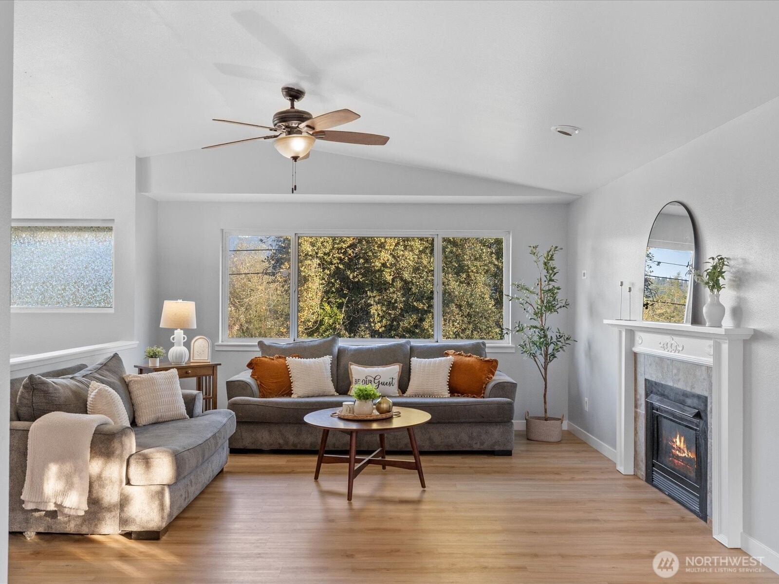 13802 State Rte 530 Northeast Arlington, WA 98223 - Photo 15 of 40 a living room with furniture and a fireplace