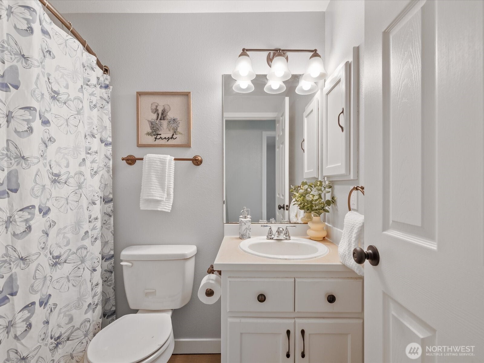 13802 State Rte 530 Northeast Arlington, WA 98223 - Photo 21 of 40 a bathroom with a sink mirror and toilet