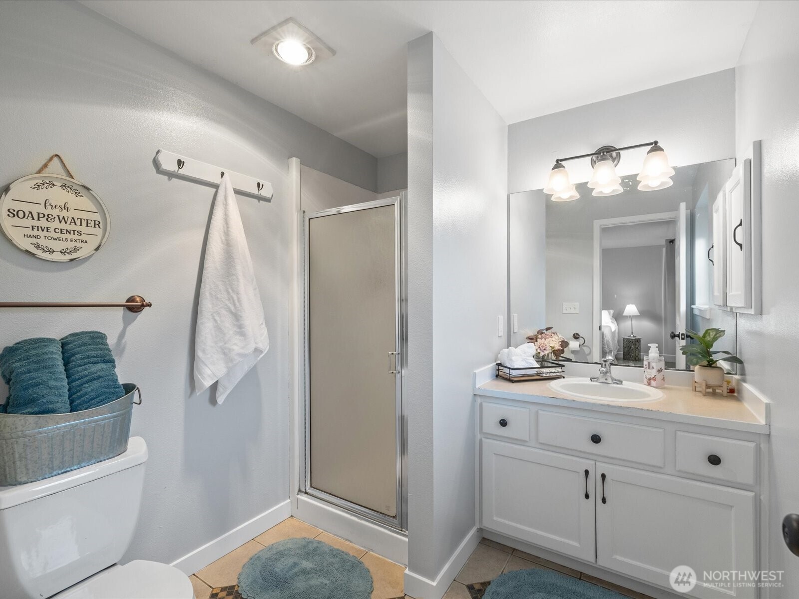 13802 State Rte 530 Northeast Arlington, WA 98223 - Photo 25 of 40 a bathroom with a sink a toilet and shower