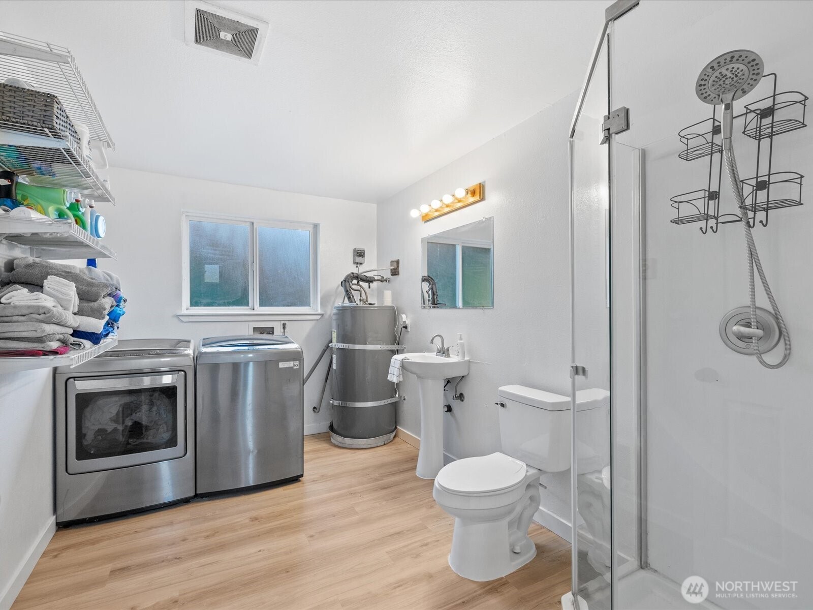 13802 State Rte 530 Northeast Arlington, WA 98223 - Photo 27 of 40 a bathroom with a toilet sink and mirror