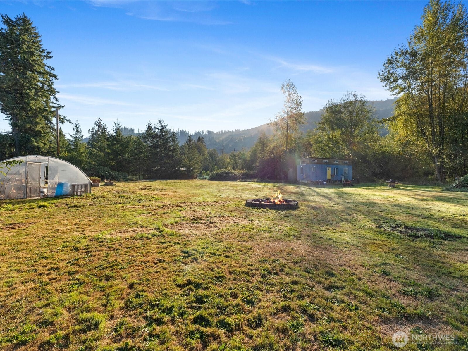 13802 State Rte 530 Northeast Arlington, WA 98223 - Photo 34 of 40 a view of a swimming pool with an ocean view