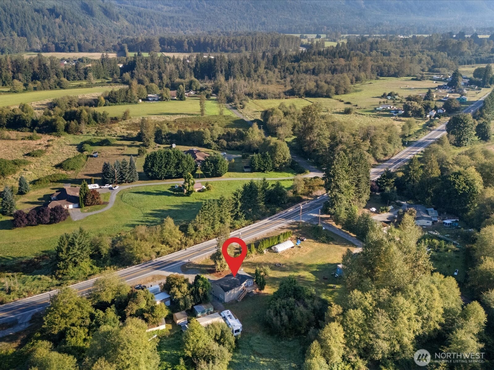 13802 State Rte 530 Northeast Arlington, WA 98223 - Photo 39 of 40 an aerial view of a house with a yard basket ball court and outdoor seating