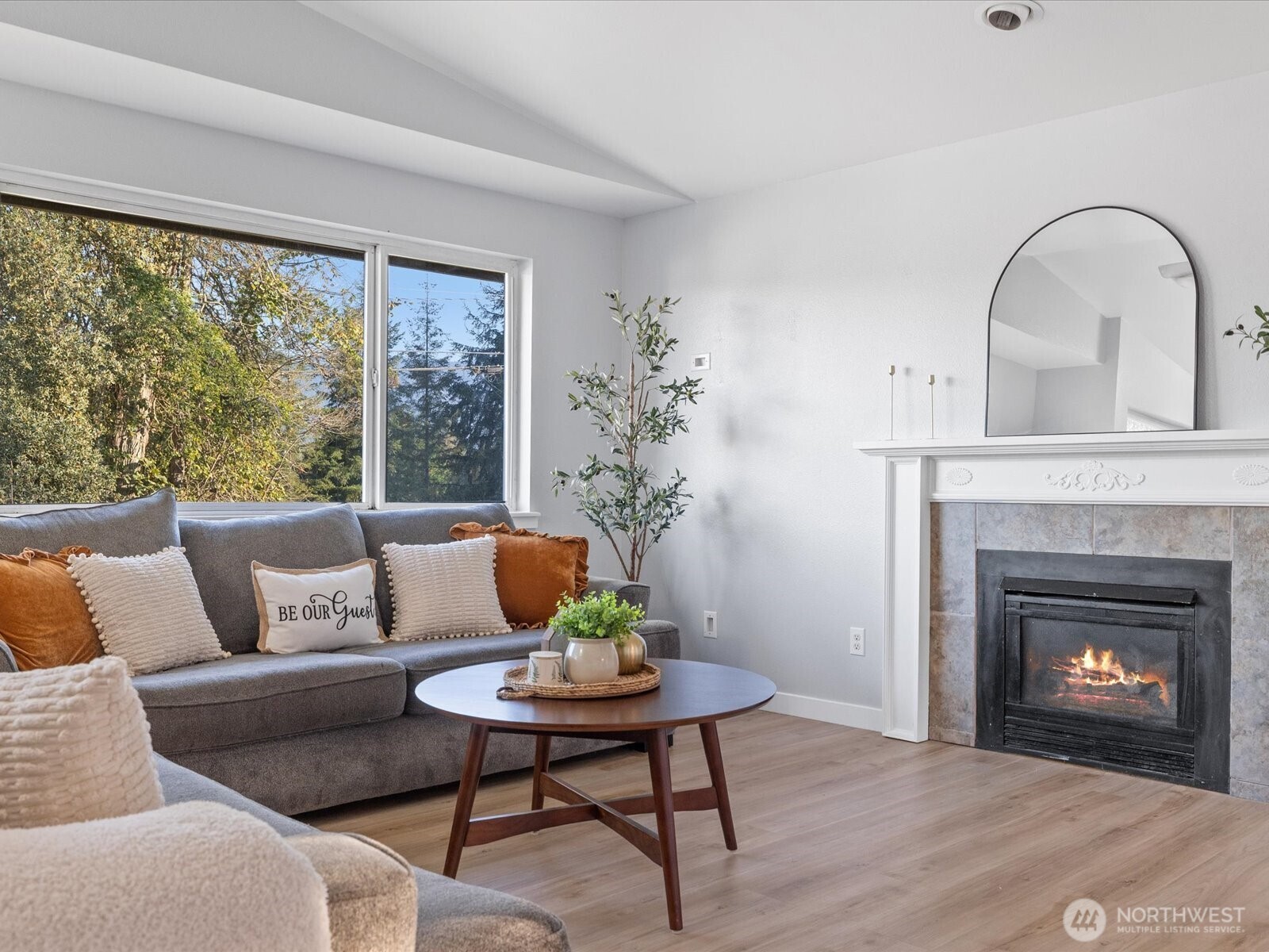 13802 State Rte 530 Northeast Arlington, WA 98223 - Photo 5 of 40 a living room with furniture and a fireplace