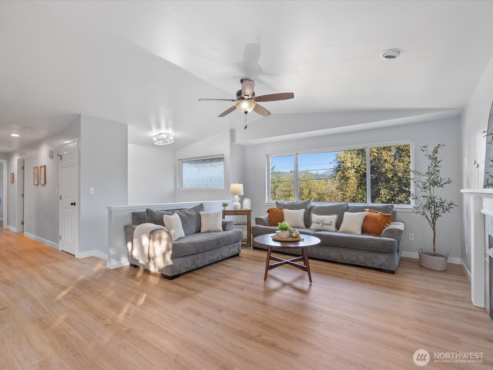 13802 State Rte 530 Northeast Arlington, WA 98223 - Photo 6 of 40 a living room with furniture and a large window
