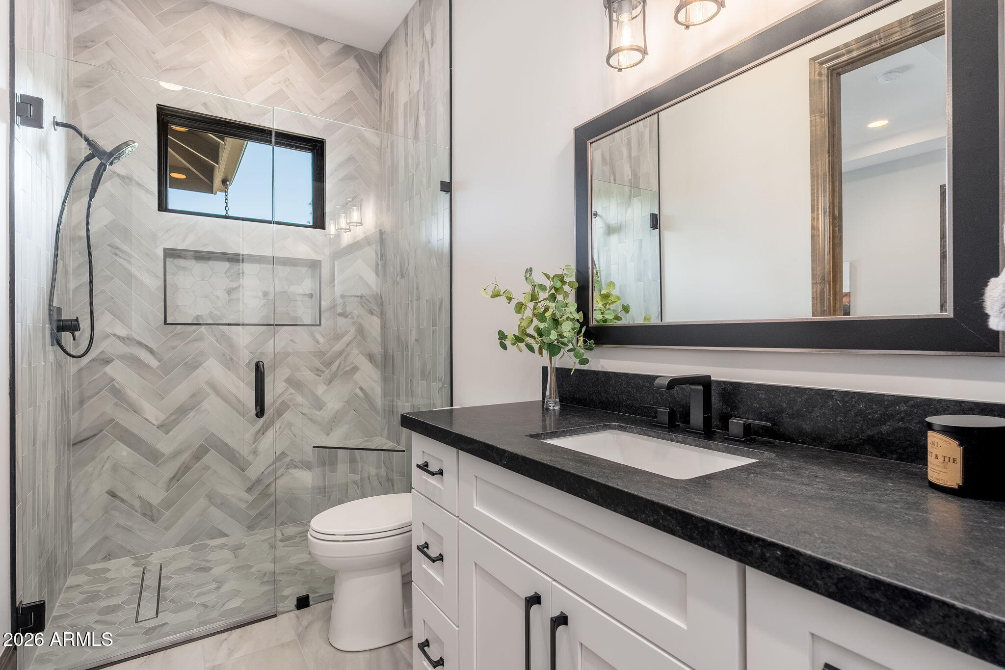 602 North Redbud Circle Payson, AZ 85541 - Photo 33 of 83 a bathroom with a granite countertop sink mirror vanity and toilet