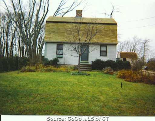 a view of a back yard of the house