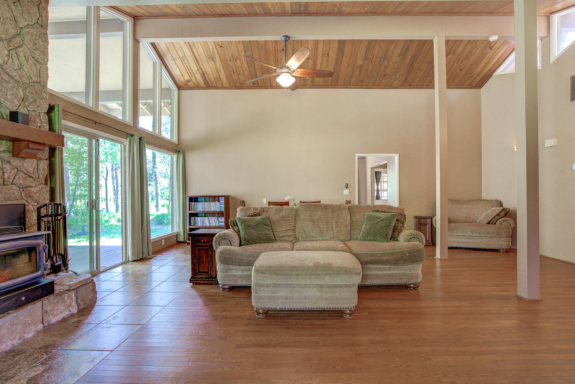 12 Billys Peak Road Trinity Center, CA 96091 - Photo 4 of 52 a living room with furniture and a floor to ceiling window