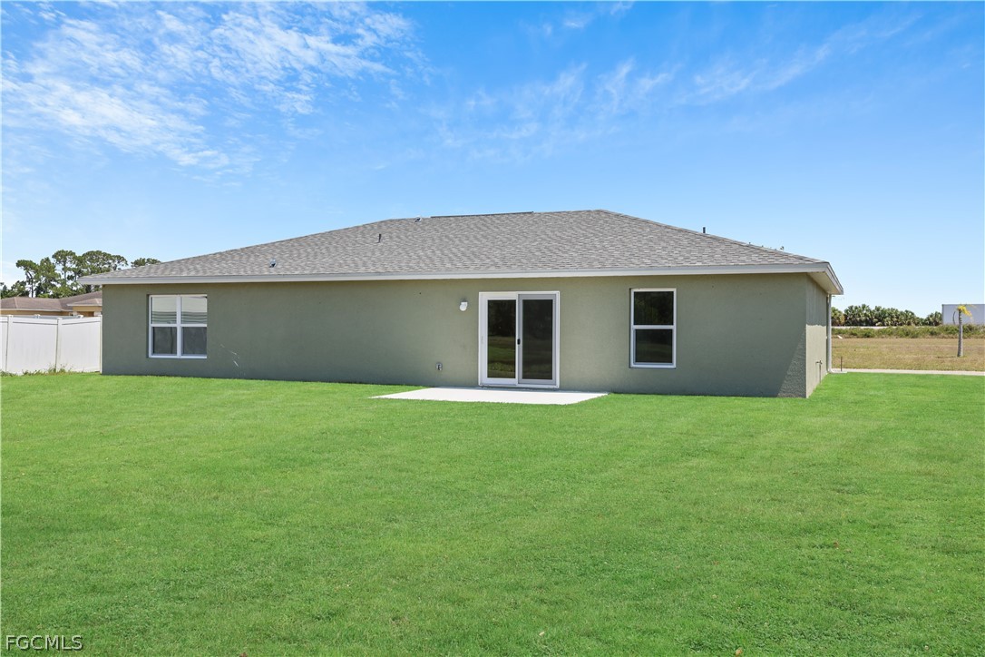 4524 Springview Circle LaBelle, FL 33935 - Photo 22 of 25 a front view of house with yard and green space