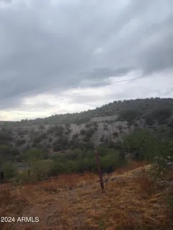a view of a town with mountains in the background