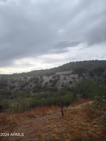 a view of a town with mountains in the background