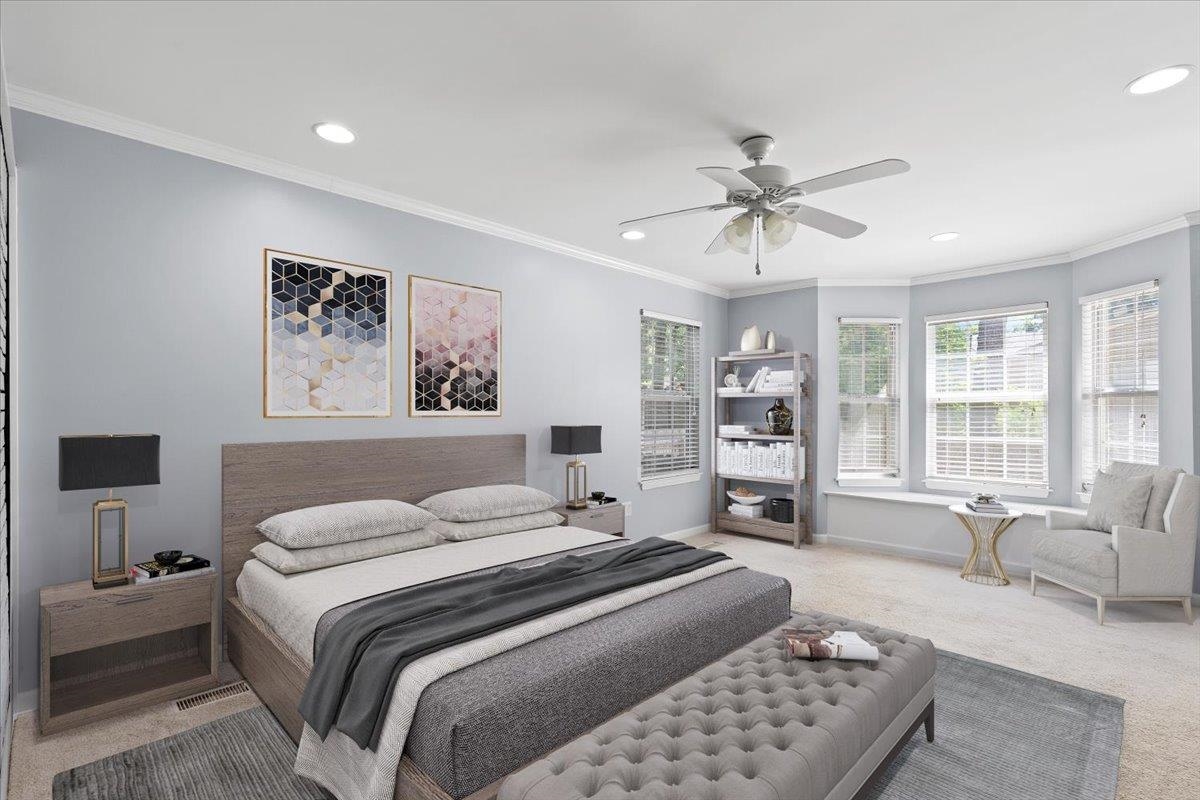 5639 Glade View Drive Memphis, TN 38120 - Photo 16 of 39 a bedroom with a large bed couch and a window