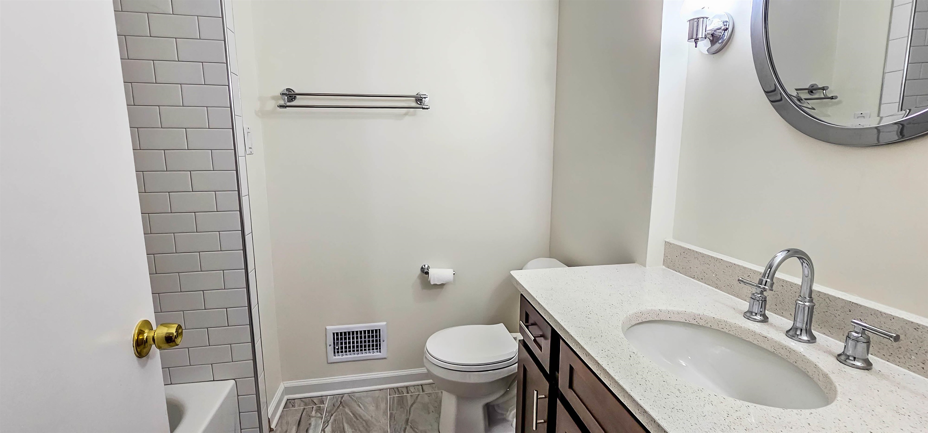 5639 Glade View Drive Memphis, TN 38120 - Photo 20 of 39 a bathroom with a sink toilet and shower