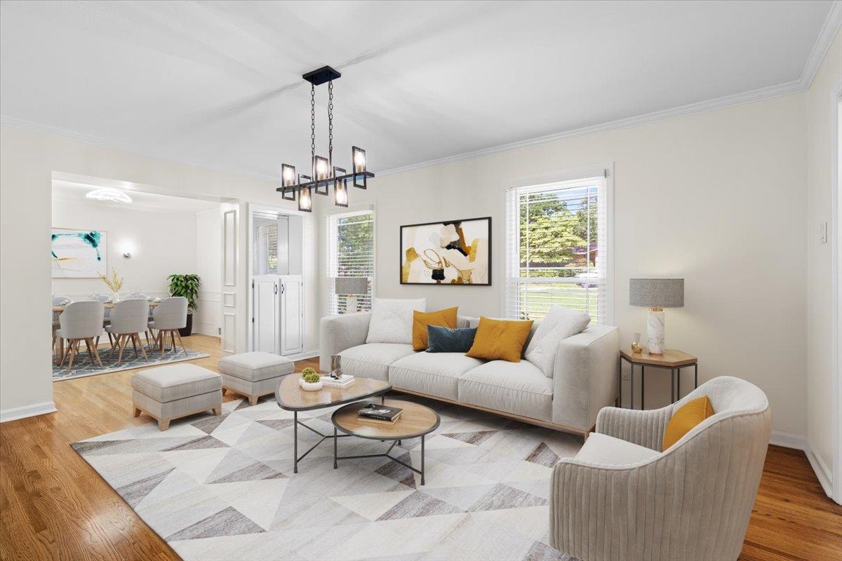 5639 Glade View Drive Memphis, TN 38120 - Photo 3 of 39 a living room with furniture and a chandelier