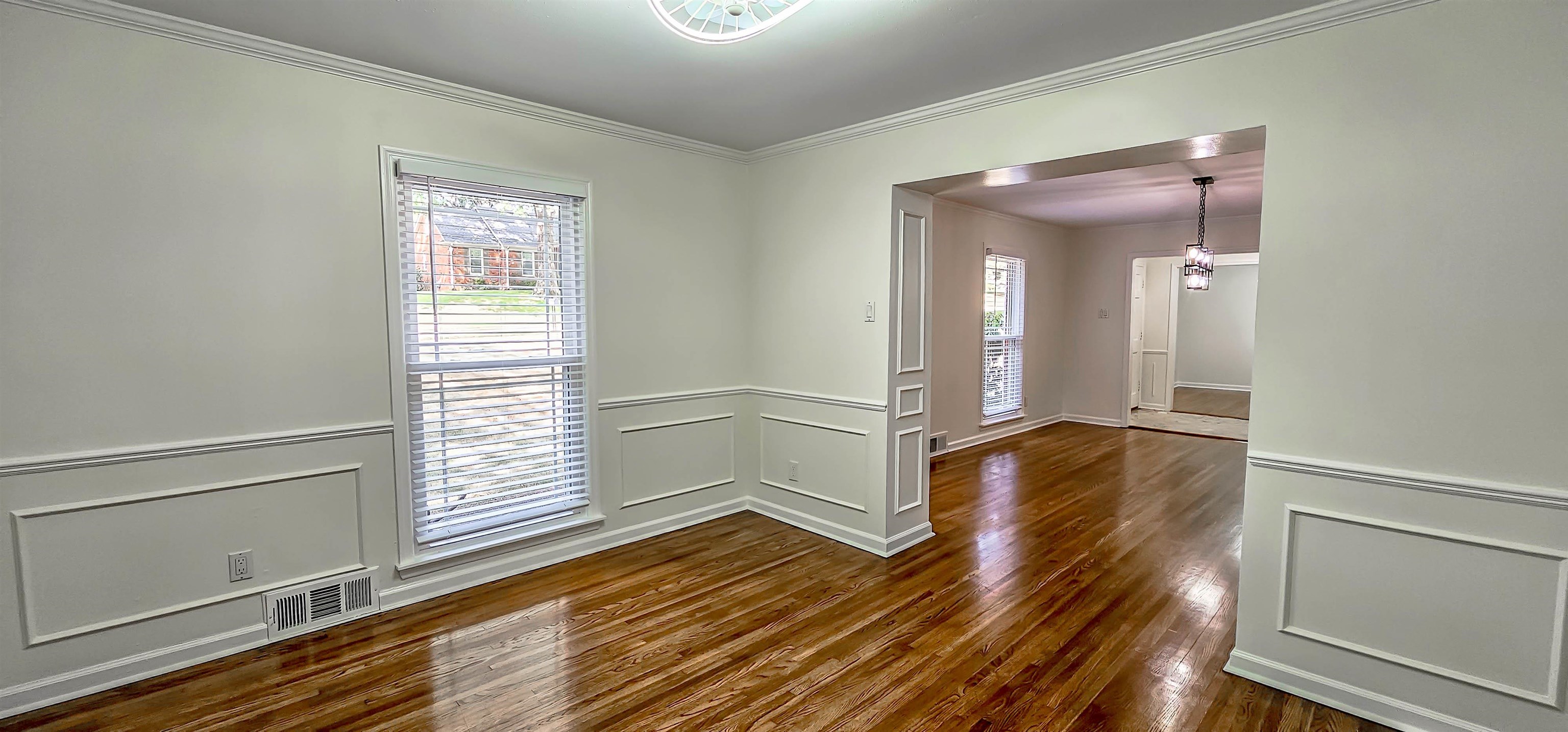 5639 Glade View Drive Memphis, TN 38120 - Photo 7 of 39 a view of a room with wooden floor and window