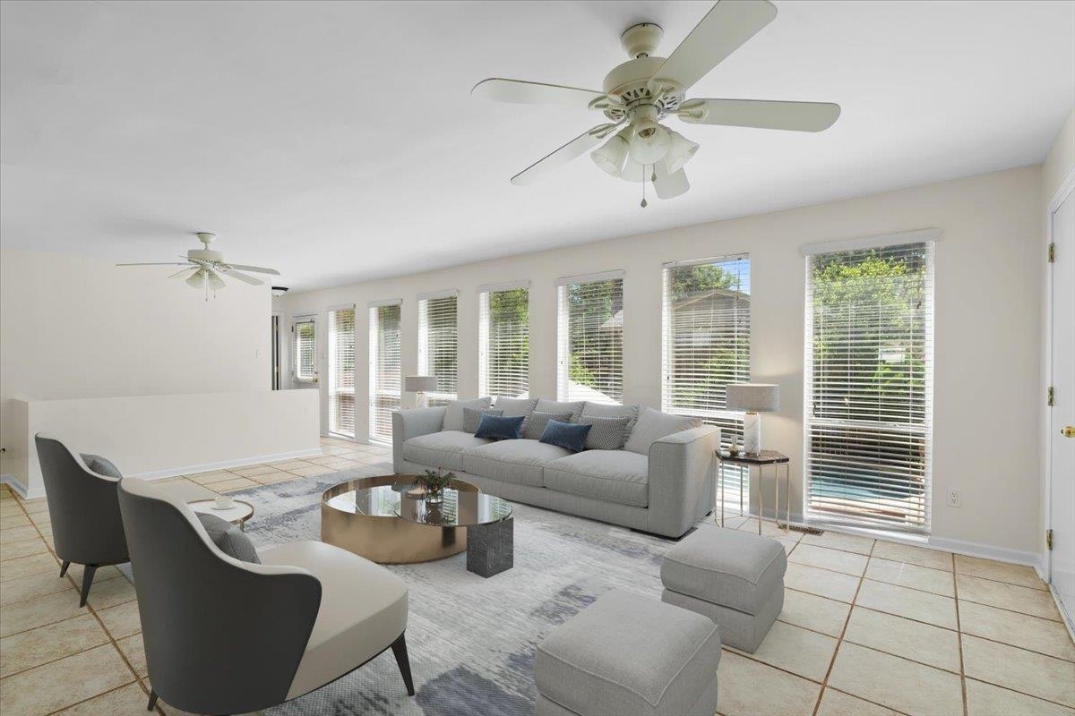 5639 Glade View Drive Memphis, TN 38120 - Photo 8 of 39 a living room with furniture and a large window