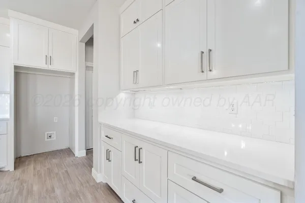 a storage room with washer and dryer