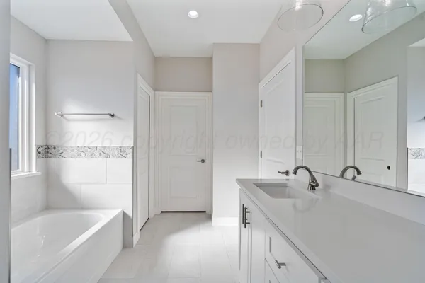 a view of a bathroom with a shower