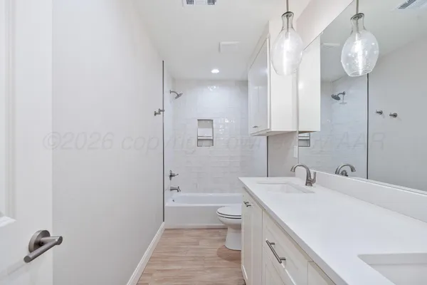 a house with trees in front of it