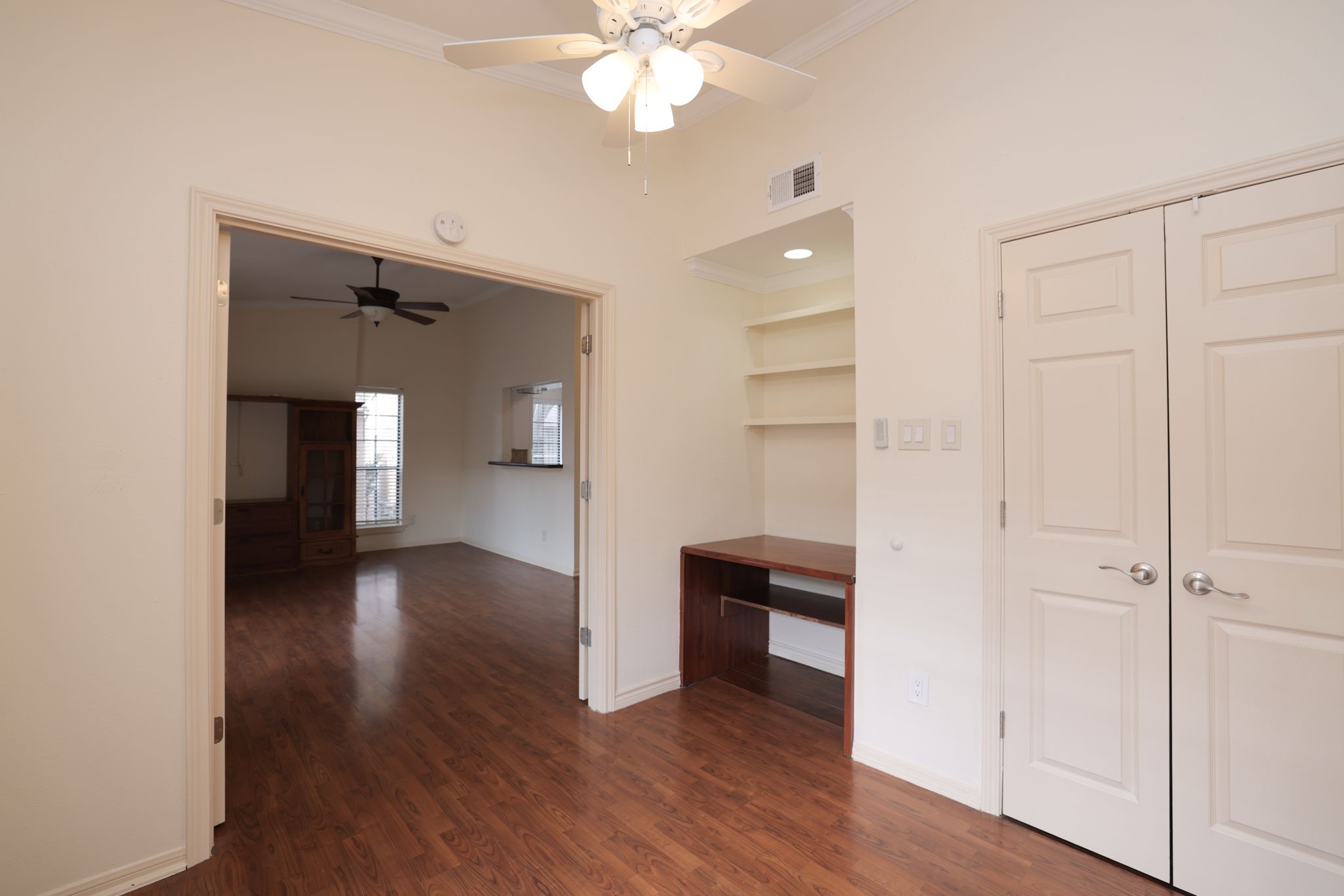 2001 Bering Drive, Unit 2F Houston, TX 77057 - Photo 18 of 32 wooden floor in an empty room