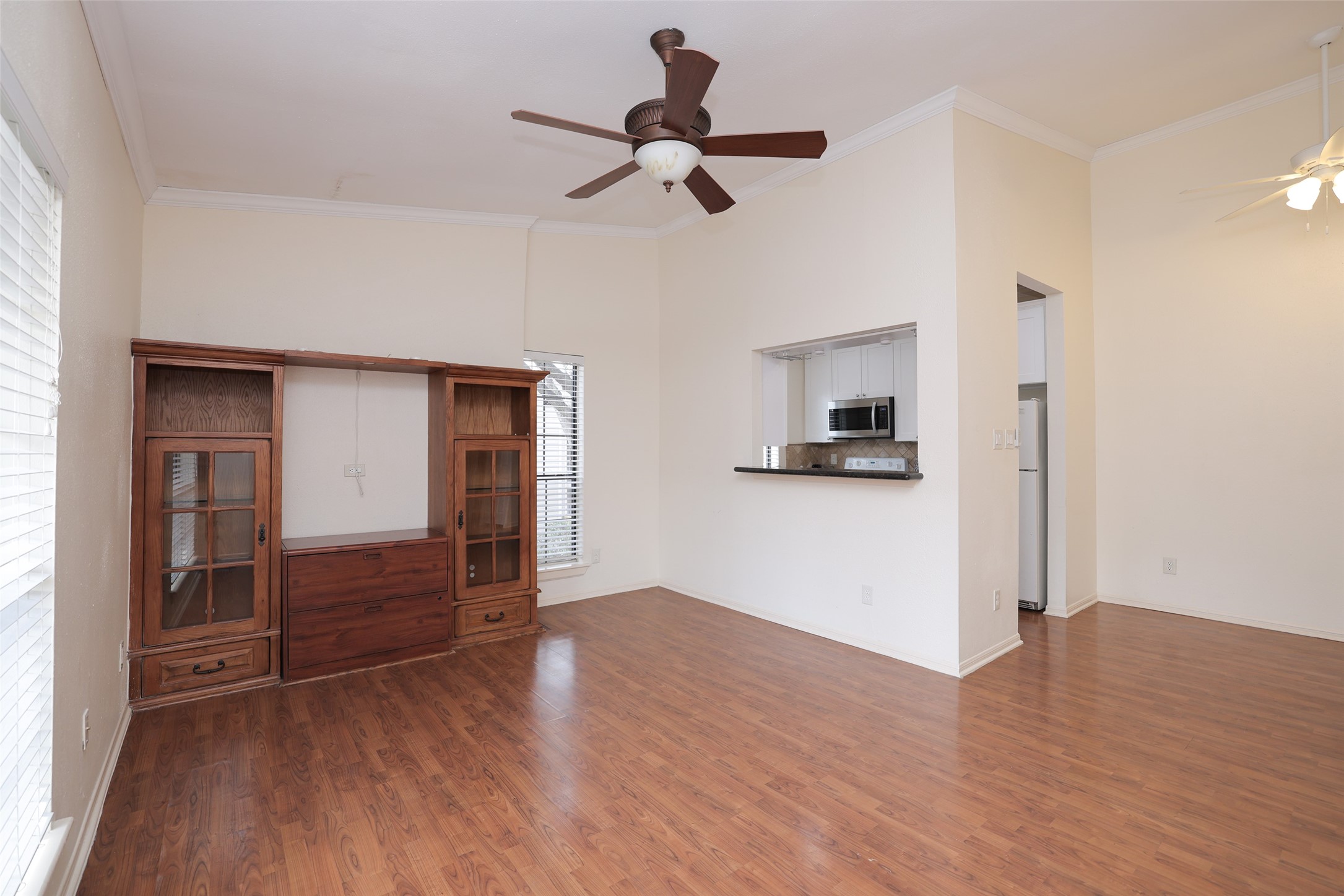2001 Bering Drive, Unit 2F Houston, TX 77057 - Photo 4 of 32 a view of empty room with wooden floor