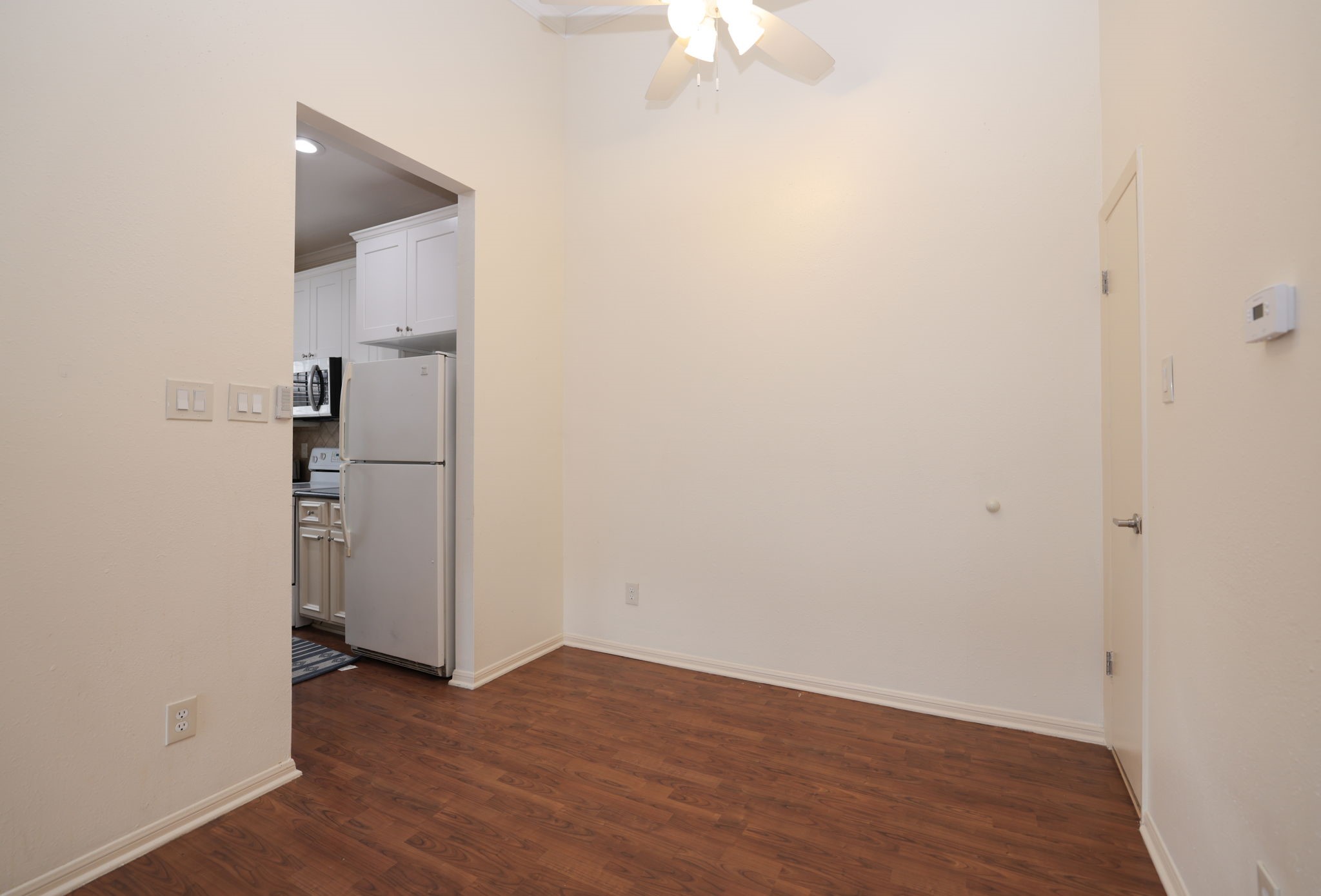 2001 Bering Drive, Unit 2F Houston, TX 77057 - Photo 10 of 32 an empty room with wooden floor and closet