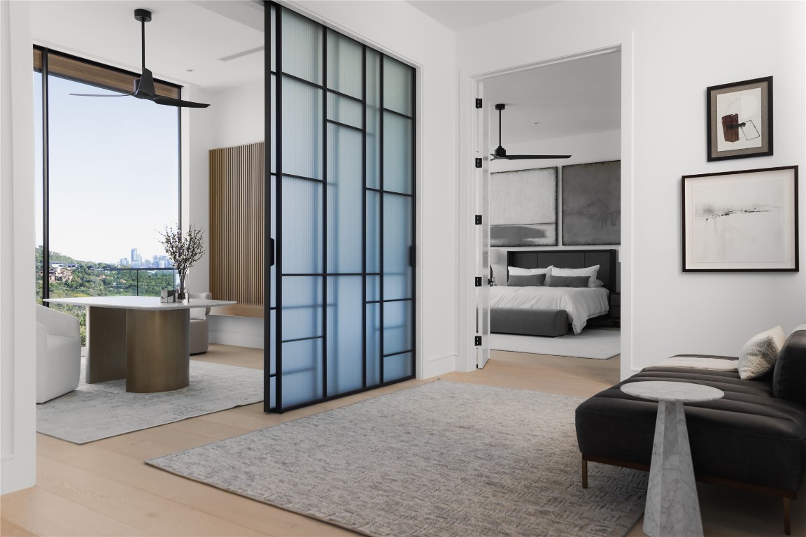 1003 The High Road Austin, TX 78746 - Photo 16 of 40 a view of a living room and a balcony