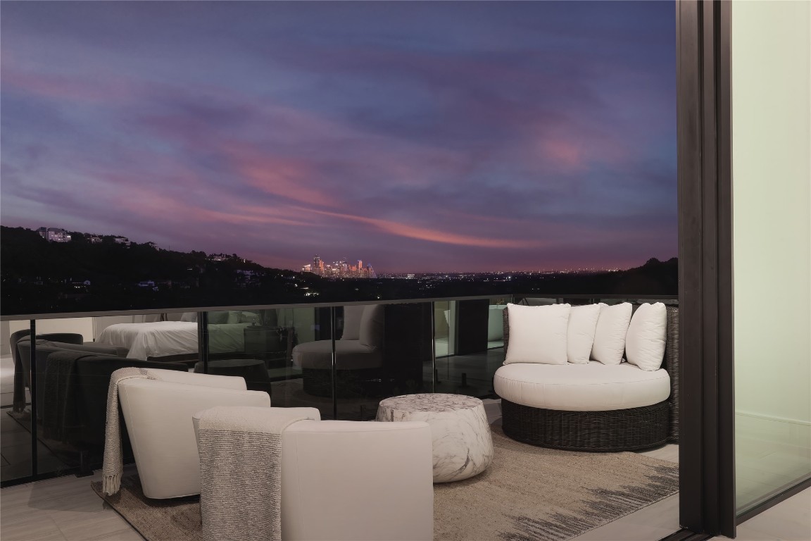 1003 The High Road Austin, TX 78746 - Photo 19 of 40 a view of a couches in the roof deck