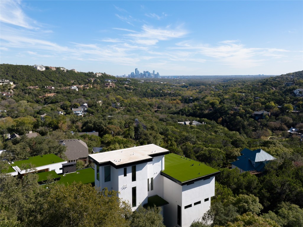 1003 The High Road Austin, TX 78746 - Photo 24 of 40 an aerial view of a house with a yard and lake view