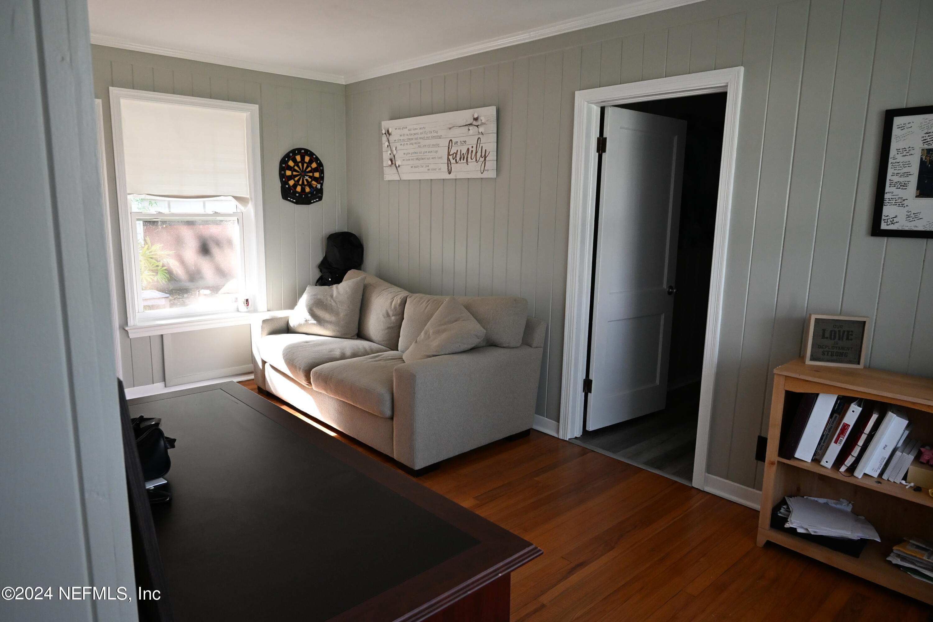 5054 Pirates Cove Road Jacksonville, FL 32210 - Photo 16 of 27 a living room with furniture and a window