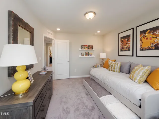 a living room with a couch and table