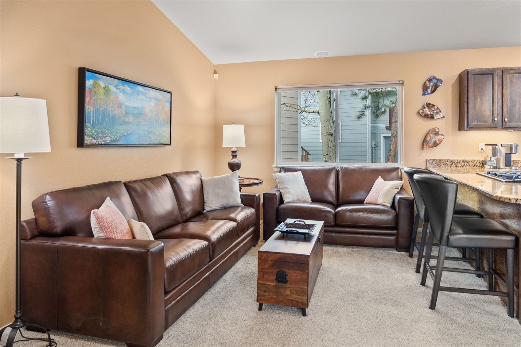 588 Alpine Road Dillon, CO 80435 - Photo 8 of 41 Living room with light colored carpet and lofted ceiling
