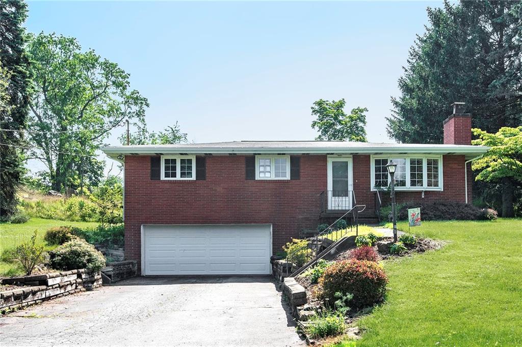 137 South McCoy Pl Road Sewickley, PA 15143 - Photo 1 of 25 All Brick Raised Ranch on a Spacious .7 Acre Lot Minutes to the Sewickley Village, Downtown PGH and the PGH Airport!