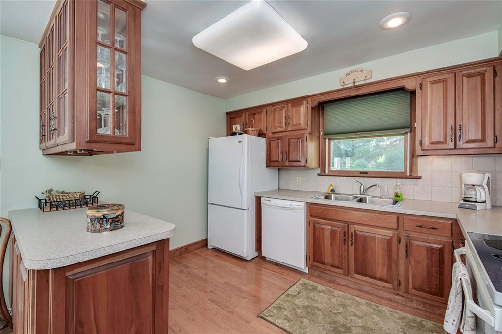 137 South McCoy Pl Road Sewickley, PA 15143 - Photo 11 of 25 The Kitchen Hardwood is Newer Than the Rest of the Home's Flooring