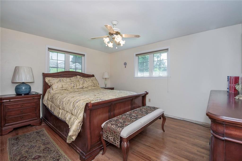 137 South McCoy Pl Road Sewickley, PA 15143 - Photo 14 of 25 Spacious Master Bedroom with Hardwood Flooring and a Ceiling Fan for Added Comfort