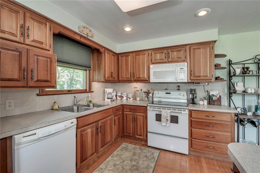 137 South McCoy Pl Road Sewickley, PA 15143 - Photo 10 of 25 Don't Miss the Recessed Lighting and Neutral Tile Backsplash