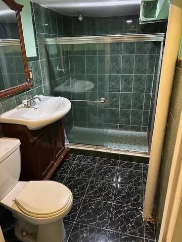 a bathroom with a sink and a toilet