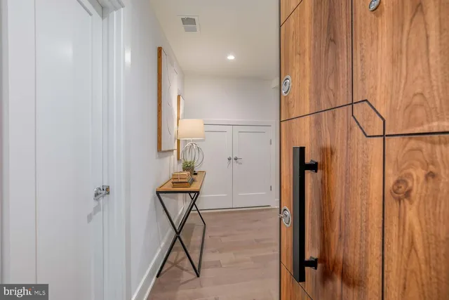 a view of entryway with wooden floor