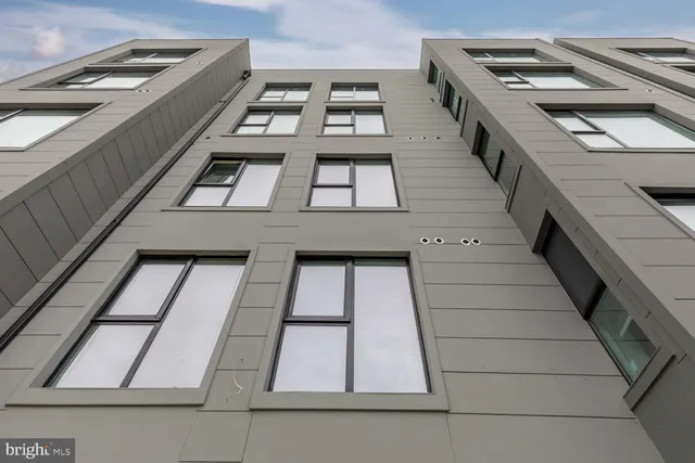 a view of a balcony with windows