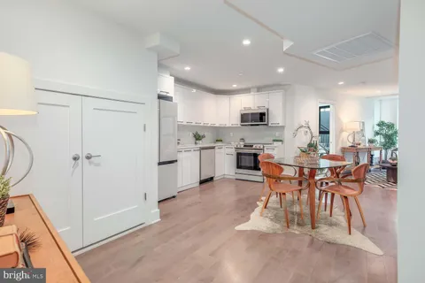 a view of a dining room kitchen and a window