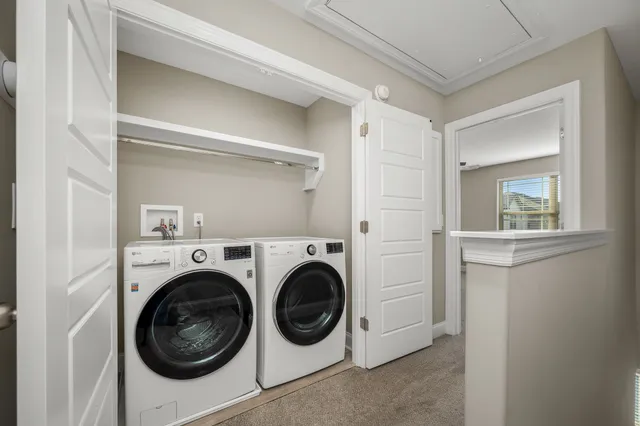 a view of house with backyard