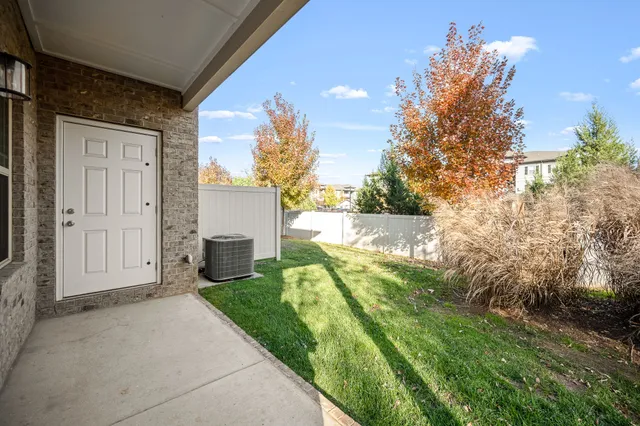 a backyard of a house with lots of green space