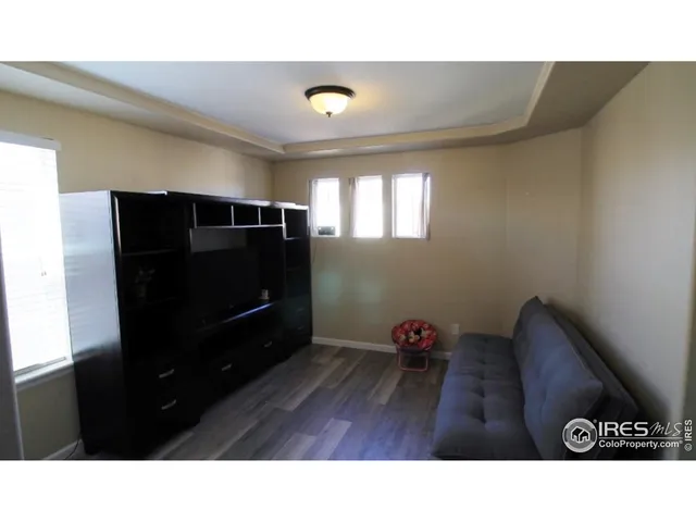 a black and white photo of a living room