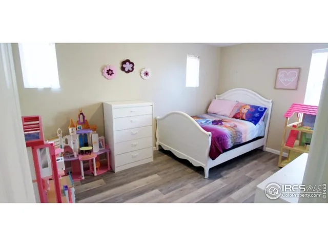 a living room with furniture and furniture