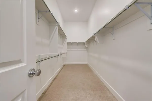 a view of a room with racks on the wall