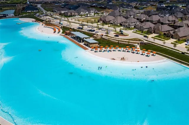 a view of a swimming pool with an ocean