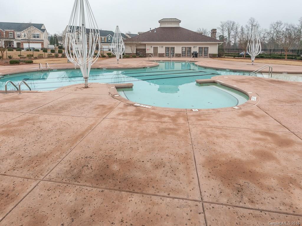 708 Elders Story Road, Unit NONE Fort Mill, SC 29708 - Photo 22 of 24 a view of a house with a yard and potted plants